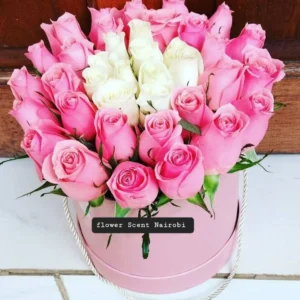 Pink and white roses round box