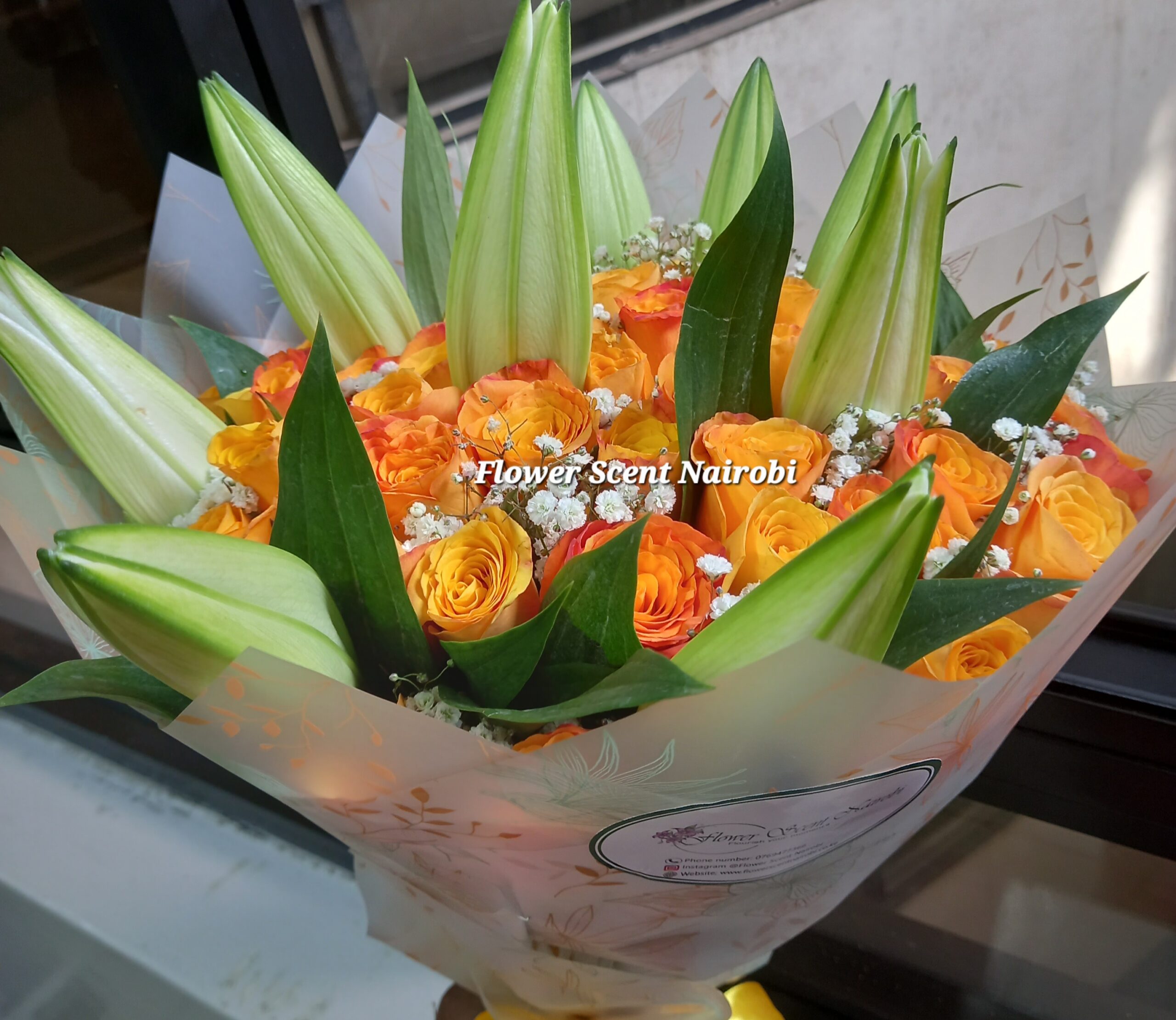 lilies and orange roses flowers
